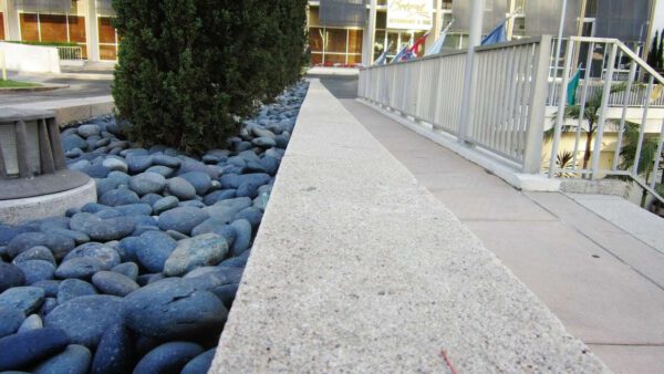 mexican beach pebbles black river rock install
