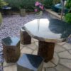 polished basalt table chairs