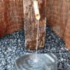 Custom Basalt Fountain - Basalt Bamboo Fountain into Polished Dish Rock
